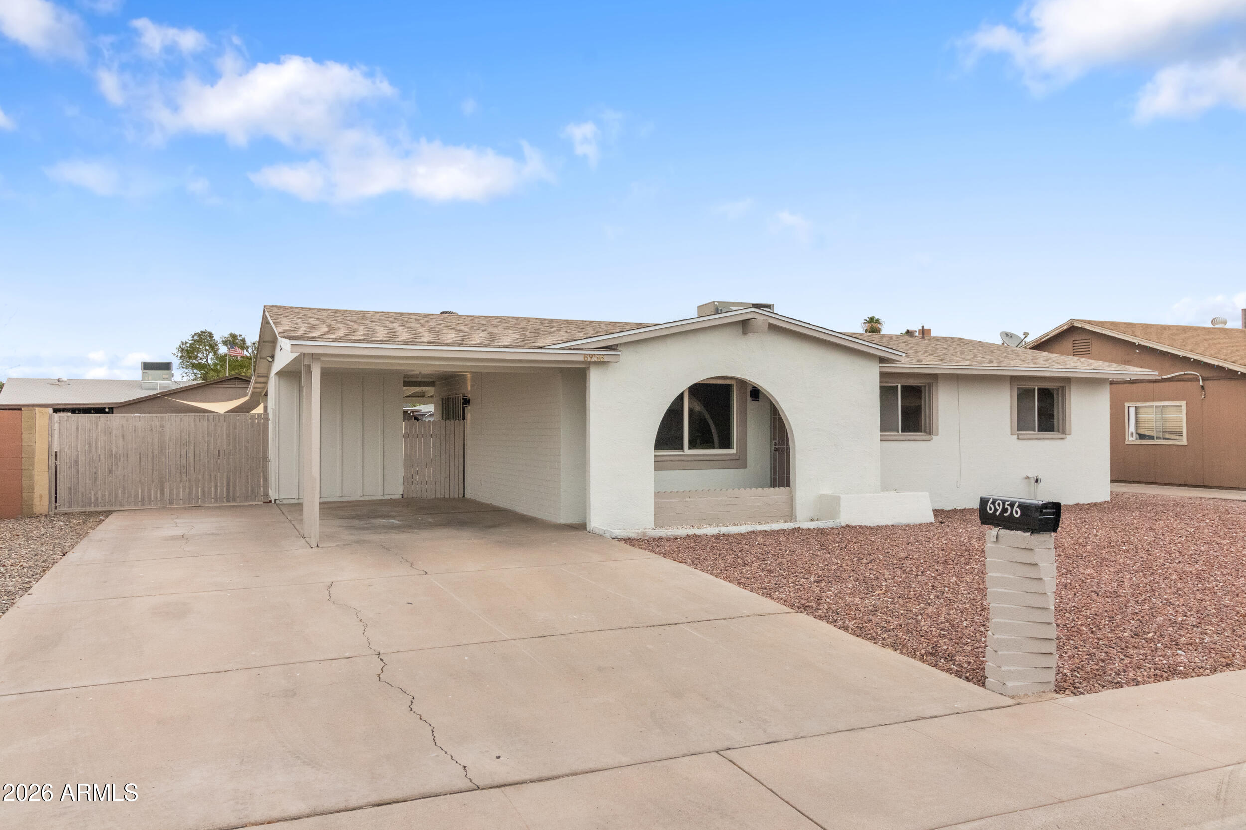 Beautifully updated 3-bedroom, 2-bath Glendale home offering style, comfort, and peace of mind. Recent improvements include a new roof, new water heater, updated kitchen, remodeled bathrooms, fresh interior paint, and updated flooring throughout. The functional floor plan provides comfortable living spaces filled with natural light, while the oversized lot features an RV gate, spacious backyard, and large covered patio perfect for entertaining or relaxing. Conveniently located near schools, parks, shopping, dining, Loop 101, and just minutes from Westgate Entertainment District, State Farm Stadium, and Desert Diamond Arena. Move-in ready with major updates already completed, making this an exceptional opportunity for first-time buyers, downsizers, or investors alike.