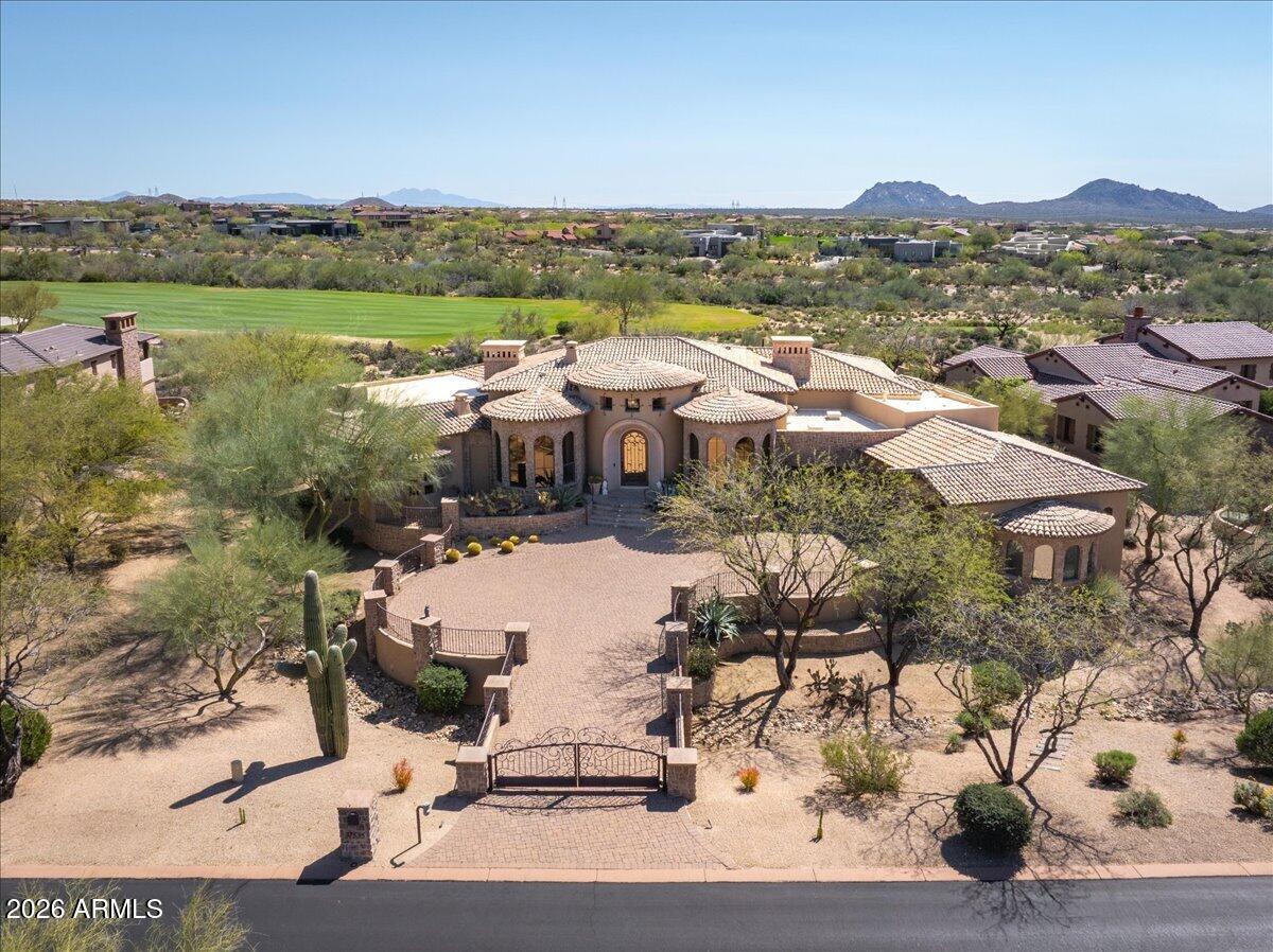 SOCIAL MEMBERSHIP AVAILABLE. Beautiful & elegant Mediterranean style home located on the 1st fairway of Tom Fazio's highly rated Mirabel golf club. Enjoy huge fairway and mountain views from this great property. Features include travertine floors, Viking appliances, an expansive great room that opens to the gourmet kitchen & wet bar. Enjoy the large, covered patio including outdoor kitchen, pool/spa/waterfall w/ Viking grill & masonry fireplace. Perfect home for living the desert lifestyle and entertaining.  Rare modest sized custom home on a fantastic lot with an outstanding floorplan that has been kept in pristine condition & rarely used. Mirabel Club membership is expedited for Mirabel Club property owners subject to the bylaws, approval process and payment of the established fees.