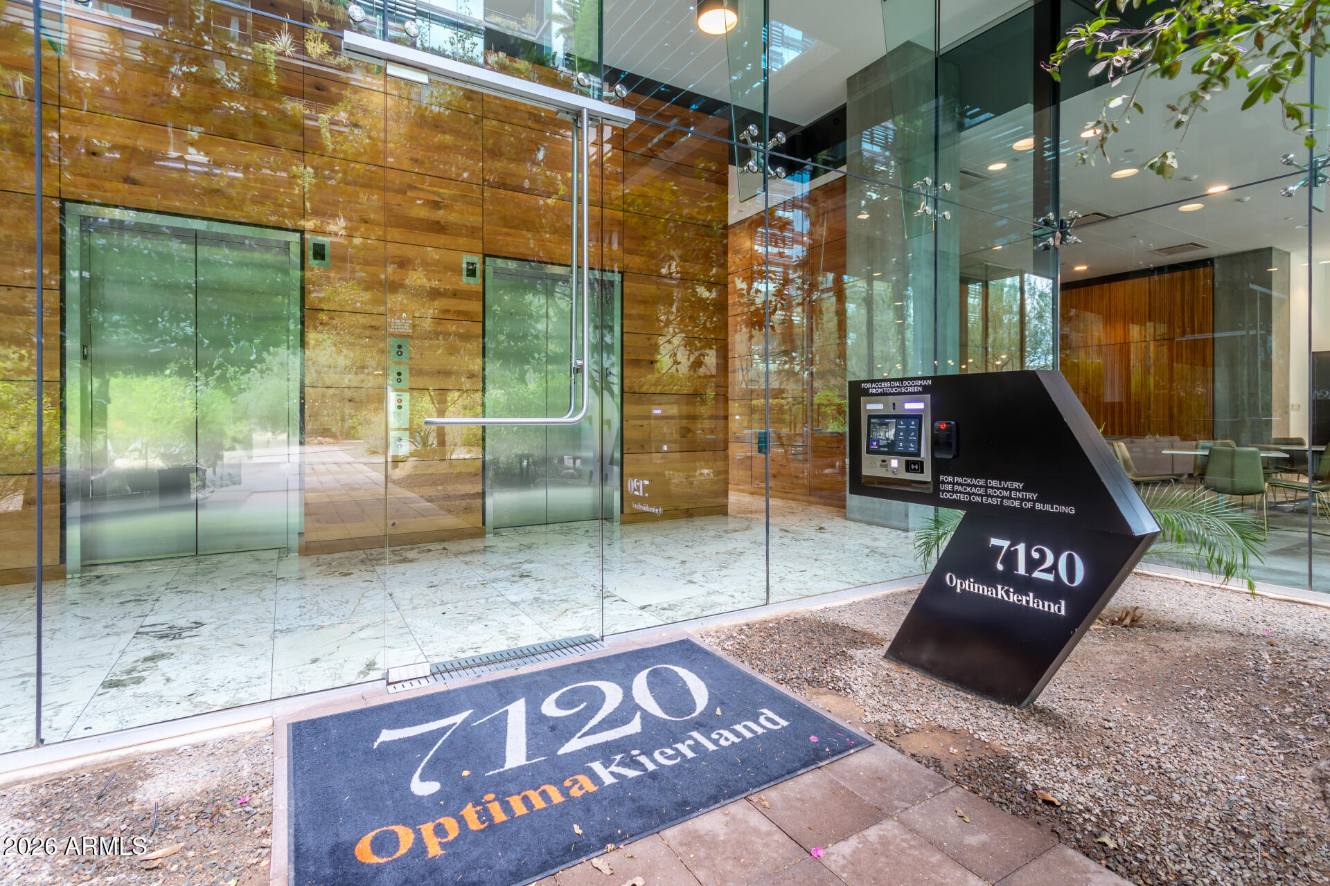 Optima style living in this sophisticated 3BD/3BA residence at Kierland, ideally positioned on the quiet interior street side away from Scottsdale Rd for privacy and quiet. It is priced aggressively and is one of the largest floor plans offered. #211 showcases Optima's signature contemporary architecture with dramatic 10-foot floor-to-ceiling glass, seamless indoor/outdoor living, and an open-concept design filled with natural light. The home features two spacious primary suites, no carpet, plus a separate laundry and storage room. Includes 2 assigned parking spots. Residents enjoy world-class resort amenities including a rooftop Sky Deck with heated pool and spa, state-of-the-art fitness center, steam rooms, cold plunge, squash court, yoga and massage.