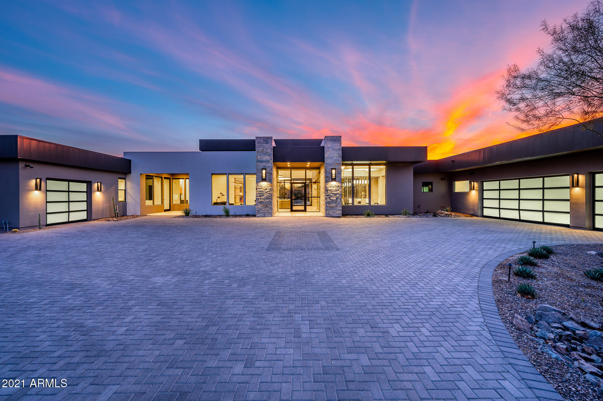 LOVE WHERE YOU LIVE IN THIS 2019 CUSTOM BUILT HOME WITH 6,494 SQ/FT OF MODERN OPPULENCE!   IT FEATURES 3 BEDROOMS, 3.5 BATHROOMS IN THE MAIN HOME, PLUS AN ATTACHED 1 BED/BATH GUEST CASITA. THIS HIDDEN PARADISE IS LOCATED IN ONE OF THE MOST DESIRABLE AREAS OF PARADISE VALLEY, WITH INCREDIBLE VIEWS OF CAMELBACK MOUNTAIN! THE OPEN CONCEPT, SPACIOUS GREAT ROOM HAS MASSIVE CEILING HEIGHT, A BUILT-IN FIREPLACE, AND MULTI-SLIDER DOORS THAT OPEN ALL THE WAY UP TO THE COVERED PATIO AREA. THE FORMAL DINING AREA AND BREAKFAST NOOK SURROUND THE OPEN KITCHEN AREA. A CHEF'S DREAM KITCHEN THAT IS SPACIOUS WITH PLENTY ROOM FOR ENTERTAINING HAS WOLF APPLIANCES INCLUDING A 6-BURNER GAS RANGE WITH GRIDDLE, DOUBLE WALL OVENS, WARMING DRAWER AND SUB-ZERO FRIDGE. THE LARGE KITCHEN ISLAND HAS A EAT-UP BAR WITH SEATING FOR THE FAMILY.  THE DINING AREA IS COMPLIMENTED BY A FREE STANDING TEMP CONTROLLED WINE DISPLAY. OWNER'S SUITE WITH ONE OF THE LARGEST WALK-IN CLOSETS IMAGINABLE, A BUILT-IN FIREPLACE AND SEPARATE EXIT OUT TO YOUR OWN PRIVATE PATIO. MASTER BATH HAS DUAL SINK VANITIES, LARGE TUB AND HUGE WALK-IN SHOWER THAT OPENS ON BOTH ENDS.  IT ALSO FEATURES A SPRIVATE TOILET ROOM WITH BIDET. BOTH GUEST BEDROOMS HAVE WALK-IN CLOSETS AND EN-SUITE BATHS. LARGE LAUNDRY AREA WITH TONS OF STORAGE SPACE AND LAUNDRY TUB. ADDITIONAL ROOMS INCLUDE A POWDER BATH AND A PRIVATE OFFICE/DEN, ALONG WITH FORMAL DINING. AN ATTACHED GUEST CASITA WITH A SEPARATE ENTRANCE FROM THE OUTSIDE FEATURES A LIVING AREA WITH UNDER COUNTER REFRIGERATOR, WET-BAR SINK AND BUILT-IN IRONING BOARD. IT ALSO HAS A BEDROOM WITH CLOSET AND BATHROOM WITH DUAL SINK VANITY A LARGE SHOWER. THE BACKYARD IS DECKED OUT WITH A RESORT-STYLE HEATED SWIMMING POOL AND SPA, OVERSIZED RAMADA WITH BUILT-IN BBQ, BAR SEATING AND SINK AND A SPORT COURT. LOTS OF LUSH DESERT LANDSCAPING, ALONG WITH SILVER TRAVERTINE TILE ROUND OUT THE FINISHES. HOME IS WITHIN WALKING DISTANCE TO THE NEW RITZ CARLTON RESORT, PALMARAIE SHOPS, GOLF, THE FINEST OF RESTAURANTS AND JUST MINUTES FROM DOWNTOWN PHOENIX AND SCOTTSDALE. CALL TODAY FOR YOUR PRIVATE TOUR!