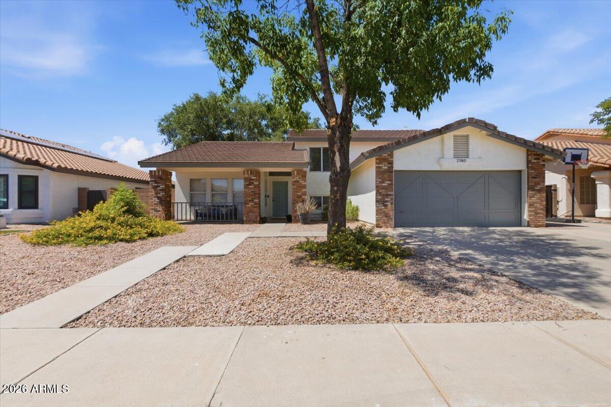 Brand NEW AC Unit installed on 06/09/2026.  Spacious 5-bedroom, 3-bath home in a desirable Chandler location with over 2,800 square feet of living space. This tri-level property features multiple living and dining areas, vaulted ceilings, a fireplace, and a functional floor plan with generous room sizes. The kitchen offers NEW APPLIANCES (2026), ample cabinet space, and opens to the main living areas, making it ideal for everyday living and entertaining. Enjoy a private backyard with a covered patio and pool, plus a 2-car garage and mature landscaping. NEWER ROOF underlayment in 2020!  New Pool Pump in 2026.  New exterior paint in 2023.  Conveniently located near parks, shopping, dining, and easy access to the 101 and 202 freeways.