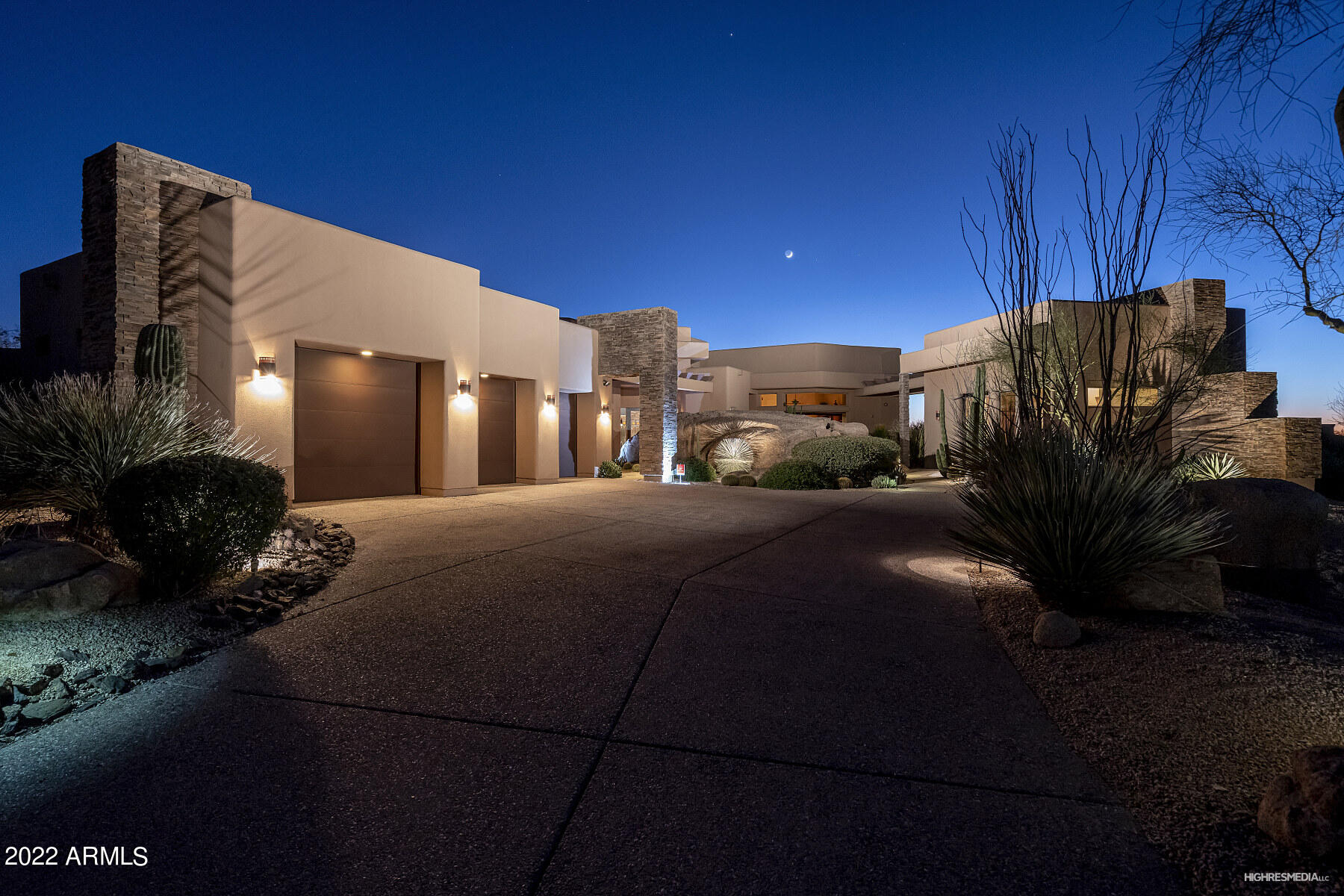 THE VACANT LOT JUST SOUTH (#90) IS INCLUDED IN THE SALE! TAKING BACKUPS! This masterpiece single level home features the inspirational touches of  Frank Lloyd Wright & the unparalleled craftsmanship is evident at every turn. Including lot #90 to the south totaling 2.032 acres, in gated Talus at Troon North. Meandering flagstone pathway intertwines amongst the oversized natural boulders, & double lead/glass mid-century entry doors flanked by 2 sidelights & continues to a detached guest casita. Flooring is natural Earth Slate & carpeting. 5288 sf w/5 Butt-Glass windows, 5 bedrooms including the office & 5 bath. 3 GAS F.P., & AMAZING STACK STONE ARCHITECTURE THRU-OUT! Dazzling city lights, SPECTACULAR mountain views, & those Arizona sunsets from this very special home. CONT The Kitchen is open to the breakfast area & family room. All stainless appliances include 48" Sub Zero, Dacor 6-burner gas cooktop, Thermador hood, Dacor double ovens/convection, warming drawer, Asko dishwasher, Kitchen-Aid microwave, GE Monogram beverage center & granite countertops. Master Suite overlooks city views including an excerise room with handrail & mirrored wall or sitting area.  Masterbath offers expansive stone shower, Jacuzzi spa tub, custom classy closet w/ additional washer dryer hook-up. 

Spectacular heated Infinity pebble-tec pool & spa ENJOY amazing city lights, mountain and colorful sunset views. Manicured desert landscaping, huge covered Flagstone patio with several different sitting areas & meandering flagstone pathway circles back to the front of home. MANY HIKING TRAILS WITHIN WALKING DISTANCE INCLUDING PINNACLE PEAK, AND SCOTTSDALE'S FINEST RESTAURENTS! Please refer to the FEATURE SHEET with additional DETAILS under documents section.