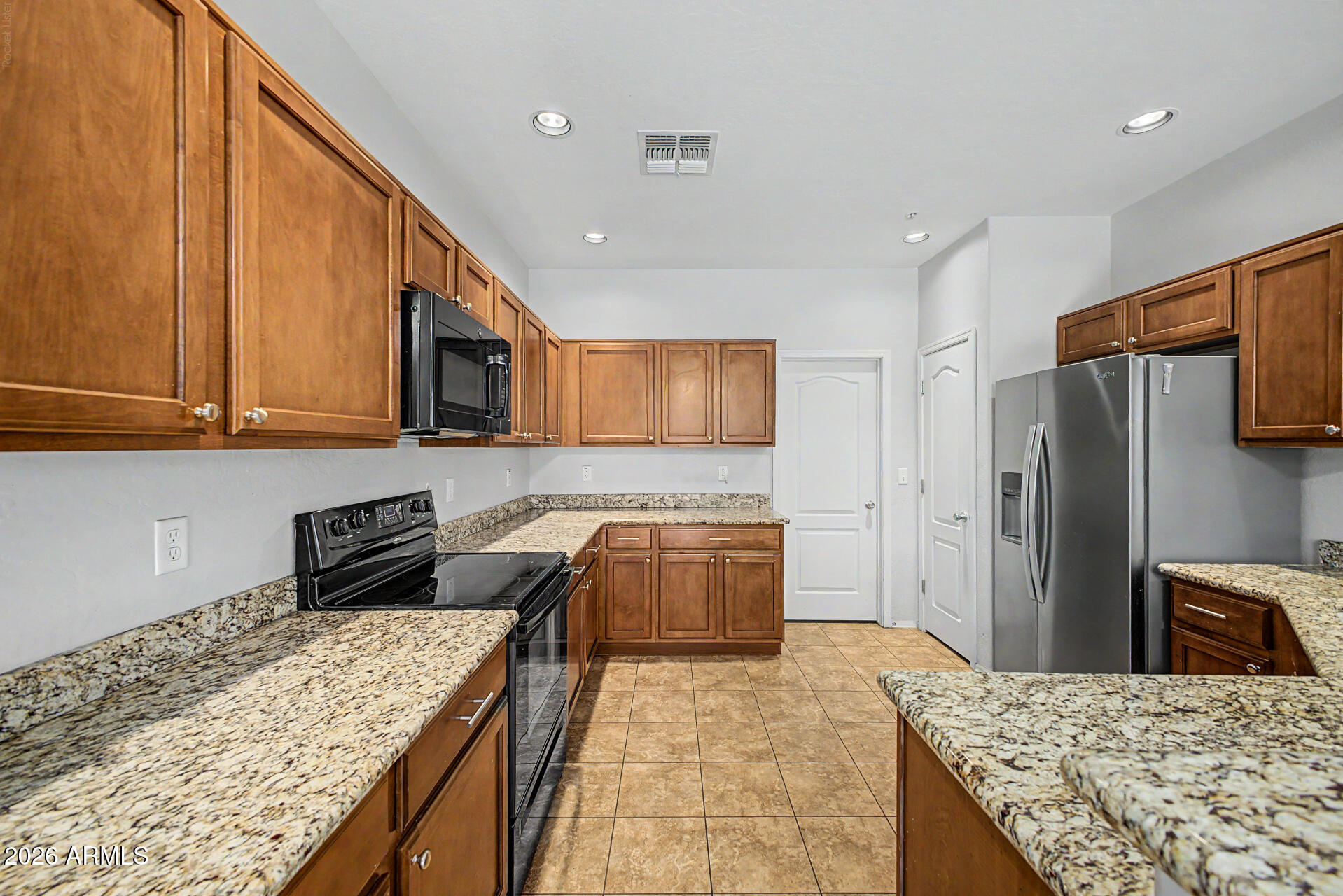Welcome to this beautifully maintained corner-lot condo in the highly desirable Muirfield Village community of Mesa. Offering 3 bedrooms, 2.5 bathrooms, and a 2-car garage, this home combines comfort, convenience, and low-maintenance living.

Step inside to find a bright, open floor plan featuring tile flooring throughout the main level, plush carpet in the bedrooms, and a neutral color palette that complements any style. The spacious living and dining areas flow seamlessly into the kitchen, creating the perfect space for everyday living and entertaining.

Upstairs, you'll find generously sized bedrooms, including a comfortable primary suite with ample closet space and a private bath. The corner-lot location provides added privacy and natural light, while the attached 2-car garage offe plenty of storage and convenience.

Residents enjoy access to community amenities, including a nearby pool, walking trails, and beautifully maintained common areas. Ideally located just minutes from the US-60 and Loop 202, commuting throughout the Valley is a breeze. Shopping, dining, and entertainment are all close by, with popular East Mesa destinations such as Charleston's, BJ's Restaurant & Brewhouse, P.F. Chang's, and the Superstition Springs area just a short drive away.

Whether you're a first-time buyer, seasonal resident, or investor, this move-in-ready home offers the perfect blend of comfort, convenience, and Arizona living.
