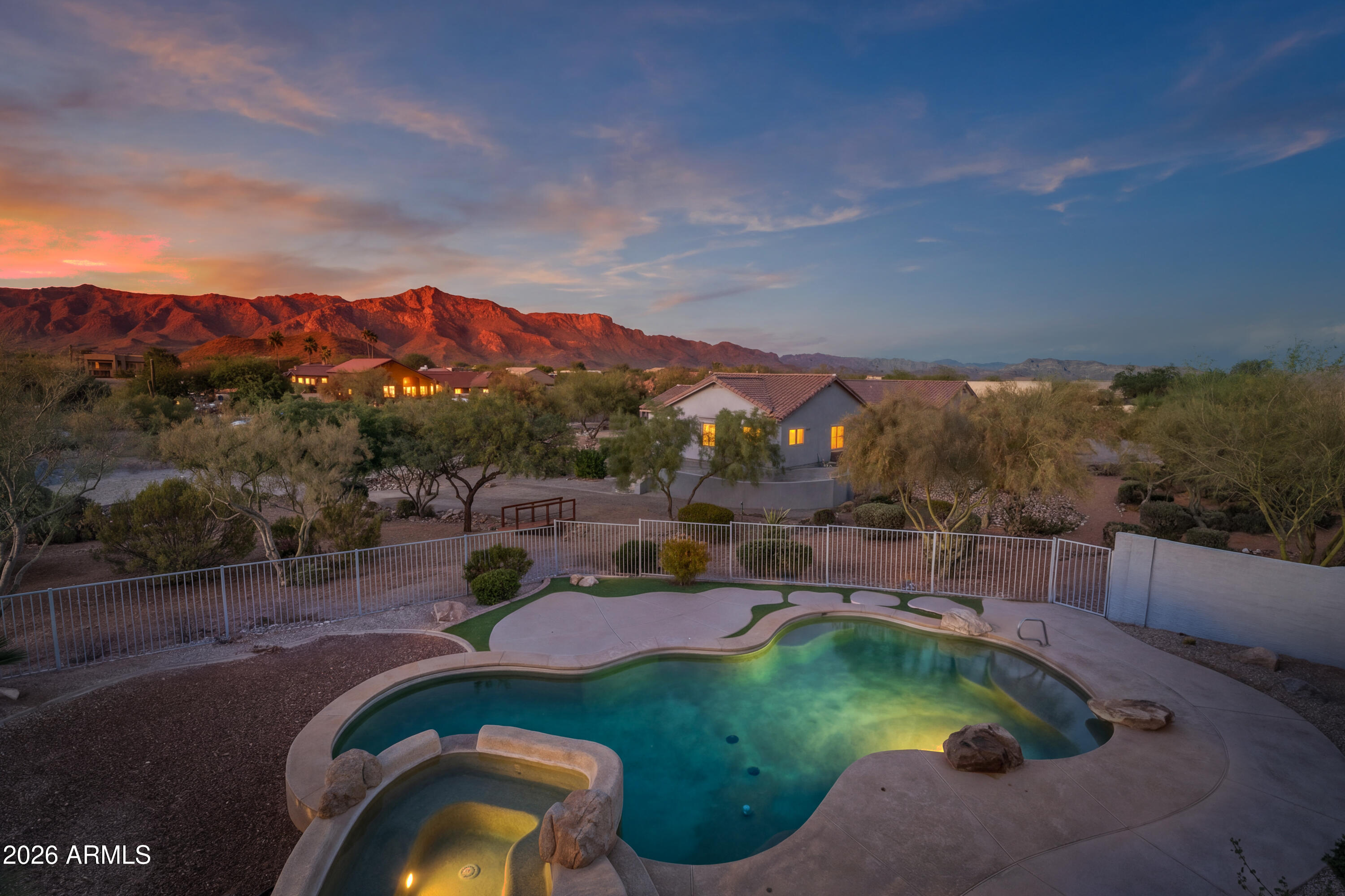 WOW! Fabulous home in Mesa Del Oro with NO HOA on 1 Acre with ***1000 SQUARE FOOT GARAGE, ***SUPERSTITION MOUNTAIN VIEWS (inside & out), ***RESORT STYLE BACKYARD offering Pool & Spa, 6 Hole Putting Green, Travertine Patio, Paver Walkways + ***MANY UPDATES include: Big Open Stunning Kitchen with Gorgeous Distressed WALNUT CABINETRY, Huge Island with STUNNING QUARTZ COUNTERS, Tasteful Pendant Lighting, High-End Primary Bath with Custom large walk-in tiled shower, LVP Flooring t/o most of home, VAULTED CEILINGS, Large Laundry Room with separate exit & Big Circular Driveway, Easy Maintenance Yard ...RELAX & ENJOY Sunrises & Sunsets, GREAT MOUNTAIN VIEWS, Privacy and so much more!  
 ***Conveniently Located, close to WORLD CLASS HIKING and Gold Canyon Golf Resort, which offers .. two 18-hole Championship golf courses (Dinosaur Mountain and Sidewinder) and Expansive PATIO DINING with amazing golf and mountain views! ***Nature lovers will ENJOY the nearby 2.9 million acres of Tonto National Forest wilderness, hiking, off-road trails plus four beautiful, pristine lakes too! Conveniently located just 35 minutes from Sky Harbor Airport and 20 minutes from Mesa Gateway Airport and San Tan Village Shopping & Dining! ***You'll LOVE the GOLD CANYON LIFESTYLE!