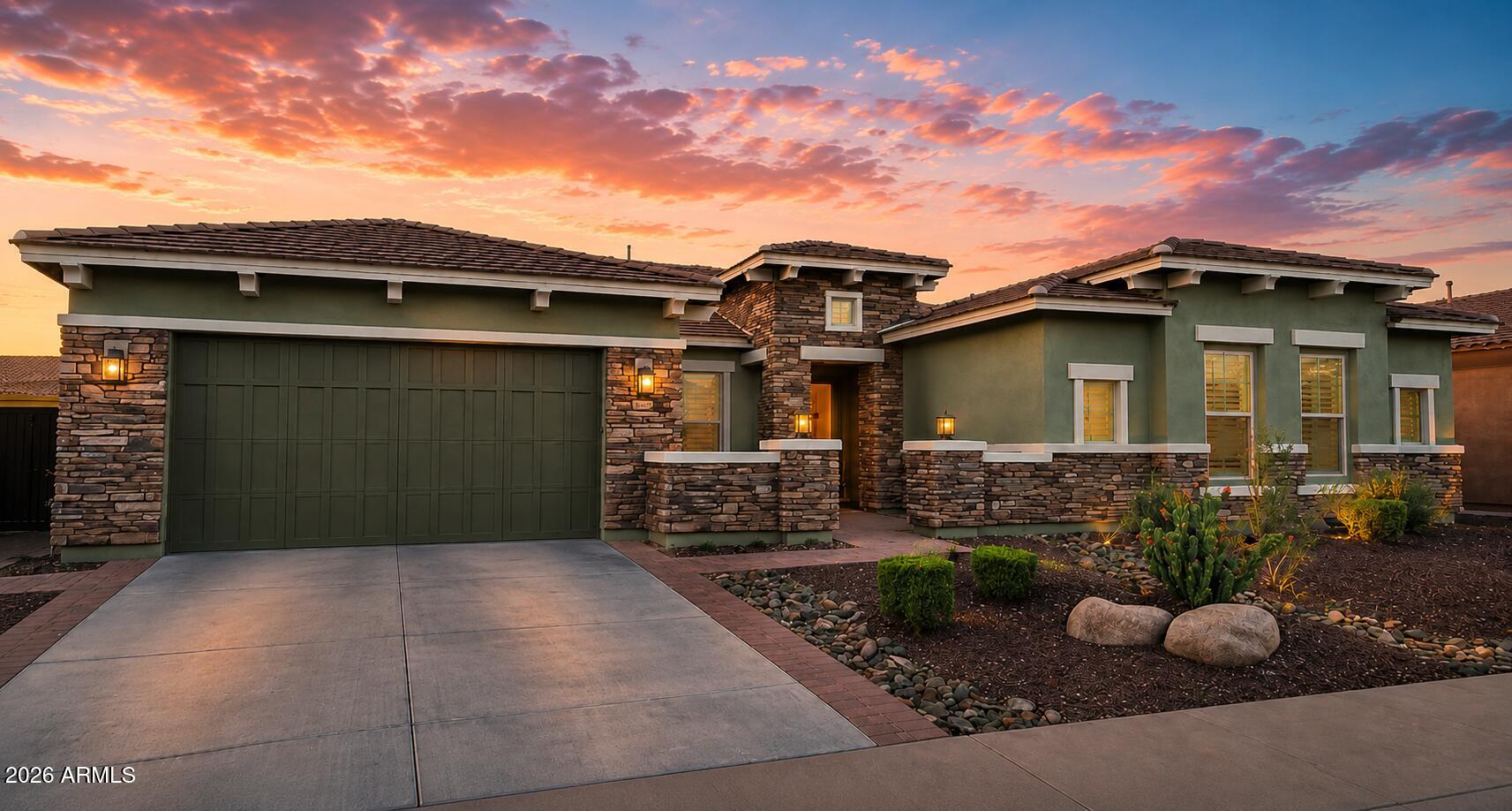 Assumable VA loan at just 2.375% is available to qualified buyers (not just veterans), offering potential savings of more than $1,200 per month compared to current market rates. Experience elevated desert luxury in the prestigious guard-gated community of Blackstone at Vistancia. Perfectly positioned North/South on a quiet street, this property combines luxury craftsmanship with outstanding energy efficiency. Designed with both comfort and entertaining in mind, the expansive open-concept floor plan showcases a stunning 16-foot sliding glass patio door for ideal inside/outside living. Thoughtfully designed for privacy and functionality, the home features four spacious bedrooms, each with its own private ensuite bathroom. The luxurious primary suite serves as a true retreat. In addition to the bedrooms, the home offers a large bonus room ideal for a media room, game room, fitness space, or secondary living area. A dedicated office provides the perfect work-from-home setup and could easily be transformed into a 5th bedroom if desired. The oversized pool anchors a backyard designed for entertaining and relaxation, featuring a built-in hot tub, gas fire pit, outdoor kitchen, and two rock waterfalls that create the perfect resort ambiance. Car enthusiasts and storage lovers will appreciate the oversized 4-car garage featuring polyaspartic-coated floors, full insulation, and mini-split A/C system for year-round comfort. With ample room for vehicles, toys, golf carts, and workshop space, the garage is as functional as it is impressive. Located within the exclusive Blackstone at Vistancia golf community, residents enjoy privacy, stunning mountain scenery, walking paths, and access to one of the Valley's premier luxury neighborhoods.
