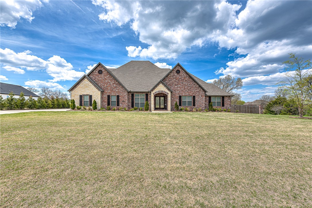 Love entertaining? Custom open concept home located within a short drive to downtown
Rogers/Bentonville. Quiet upscale neighborhood features large lots & beautiful homes. Walk
through the oversized French doors & you’ll be greeted by a HUGE 1200 sq ft living space. Main floor features dining room/office, magnificent owners suite & guest wing where you will find 3 large bedrooms 2.5 baths. Kitchen has professional appliances, double oven, quartz countertops, oversized island, & gas range. Upstairs there's an additional guest suite with large bonus space featuring wet bar and fireplace. All bedrooms feature large closets. High ceilings throughout. Backyard with privacy fencing, covered porch & built-in grill. Motorized sunshade makes outdoor living possible year-round. Meticulously maintained.
Additional features: oversized 4 car garage, central vac, irrigation, outdoor Lutron lighting, NEST
thermostats, custom Christmas lights & too many other details! You must see this GORGEOUS
home!