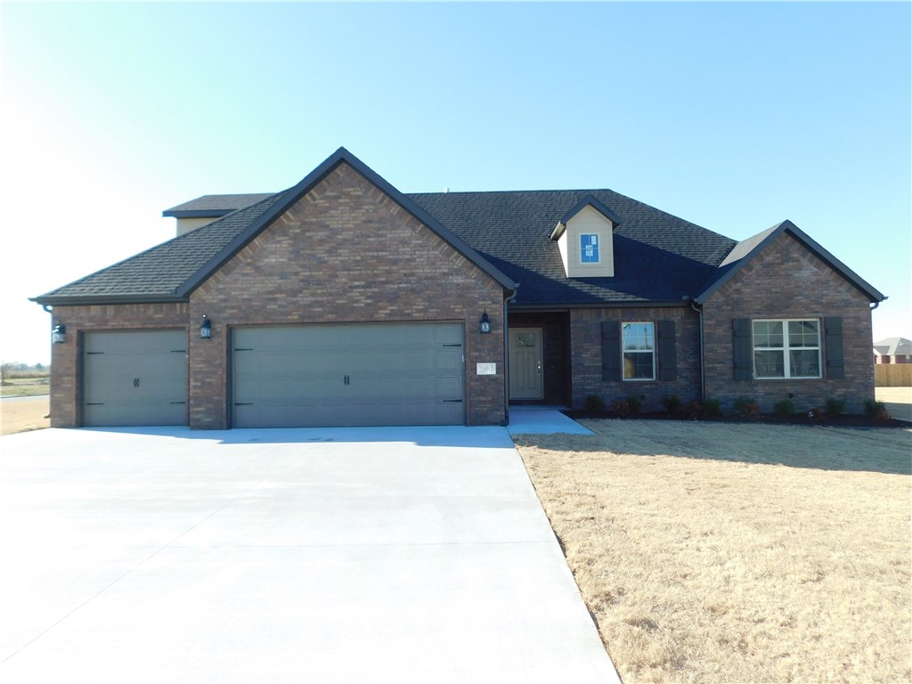 Lots of rooms in this beautiful new brick home. 4 BR with a study that has closets and could be a 5th bedroom, 2 BA, 3 car garage, open floor, crown molding, stainless appliances, covered patio and many high quality finishing touches.