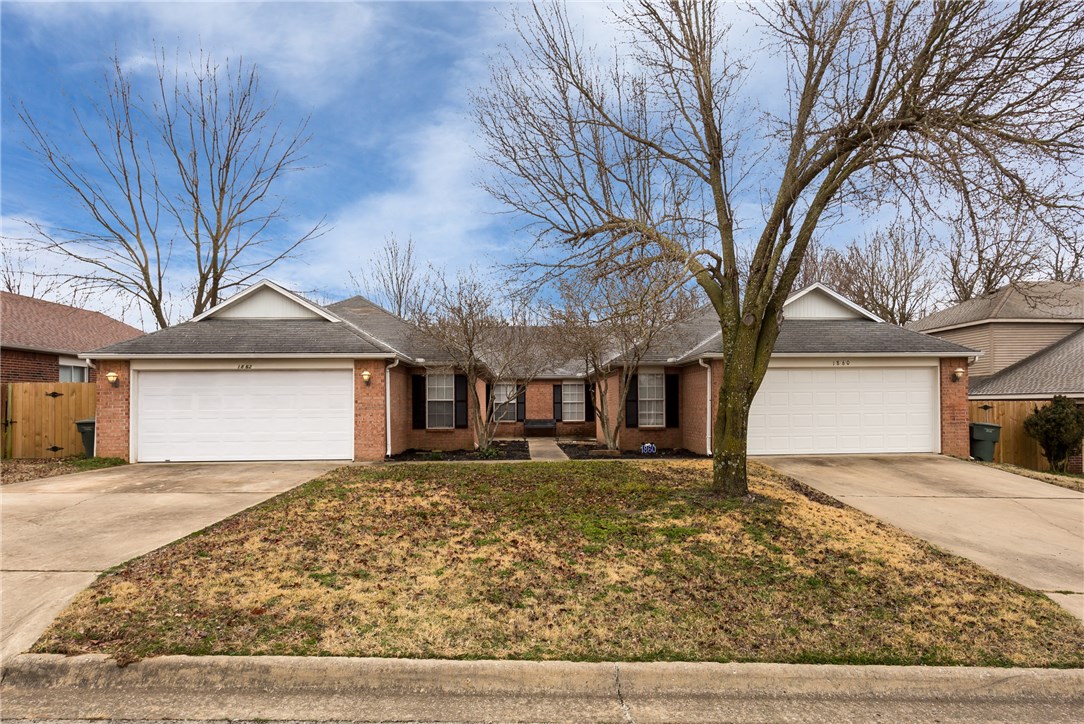 Great 3 bedroom 2 full bath duplex with 1,450 sqft per side! Close to U of A and everything else Fayetteville has to offer! Includes privacy fenced backyard, utility room and pantry on both sides, nice open floor plans, new A/C with warranty and 2 car garage for each unit, new paint, some new light fixtures,appliances and blinds property is in great shape and ready to rent.  Fantastic investment opportunity! 1 unit (1860) occupied until June 1st 2019. please do not bother tenant! Please show unit 1862 on the left.