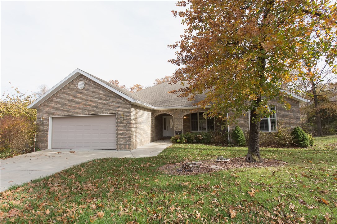 $5K SELLER UPDATE ALLOWANCE!  Only 1/2 mile off of Hwy 71. Close to Bentonville and all of NWA. Beautiful and spacious one level home with 3 bedrooms, 2 bathrooms, and 2 living areas! Huge private deck overlooking the wooded back yard. Bright eat-in kitchen with appliances. Plenty of space to relax and unwind! Home also has a large side yard and potential dry storage areas under the house. There is also a yard sprinkler system!! Many great features in this quality and impressive home.