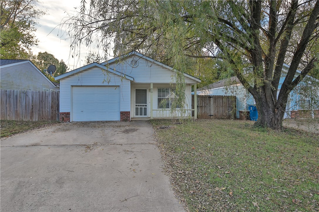 Charming home in great area of Bentonville.  This won't last long!  Great starter home or rental investment.  Minutes to home office and downtown Bentonville. Privacy fence in backyard. Nice and clean interior with wood laminate flooring, spacious living room, separate utility area, and pantry.