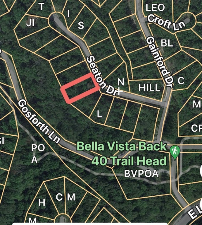Nice building lot, perk test available upon request. there are two lots next to this one that are listed with same agent, the one lot to the left side has a ditch running through it ,but if you bought all 3 lots , you could build on two of them and use the one in the middle to add more acreage to each lot on both sides. 
Back 40 trailhead backs up to these lots. Enjoy all BellaVista amenities.