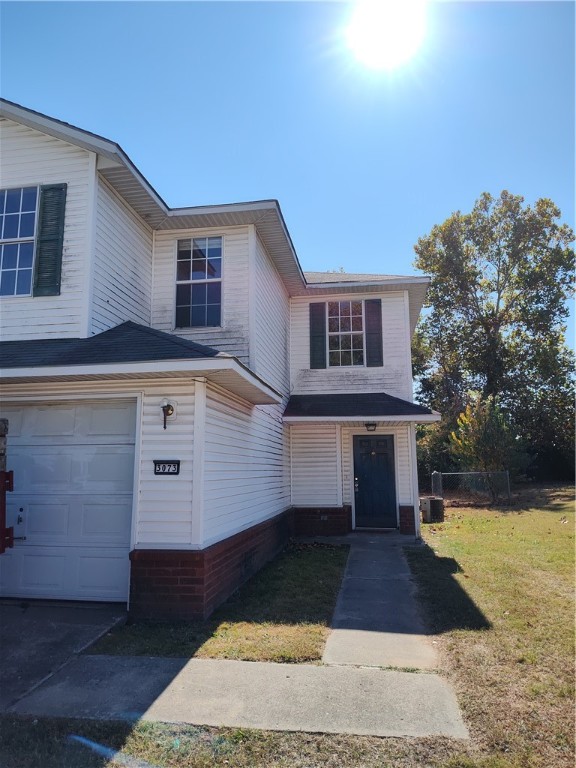 New luxury vinyl plank on the stairs and in the bedrooms, everything else is tile. Freshly painted 3 bedroom 2 1/2 bath duplex that has a 1 car garage. Nice fenced in back yard. Great location. Broker is related to the owners.