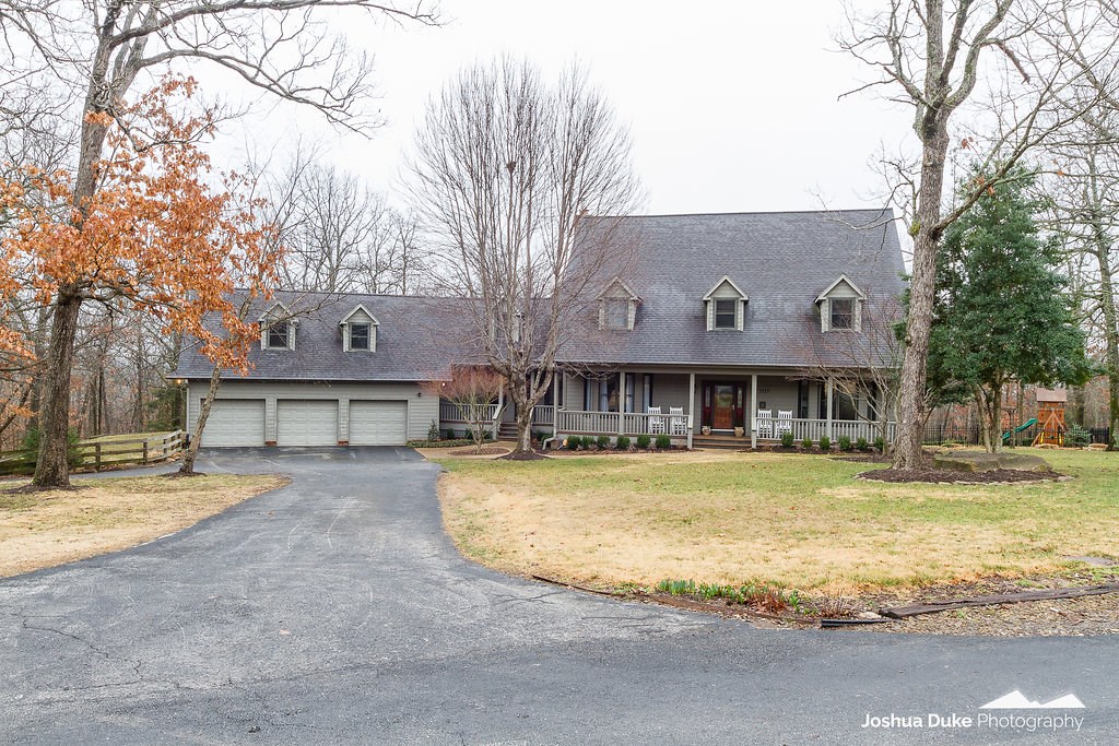 East Fayetteville dream home!!  Situated on 4.10 acres of private serenity on a coveted street. 5,786 heated sq ft offers 4-5 bedrooms, 3 full & 2 half baths, huge open kitchen to living, study, formal dining, bonus, wet bar, sunroom, heated & cooled basement workshop/gym, 3 car garage and tons of storage. New HVAC, nest thermostats, remodeled kitchen, laundry, master bath & closet in 2017, refinished hardwood floors, new light fixtures, can lighting, landscaping, and wrought iron fencing.  Zoned for Root School district.