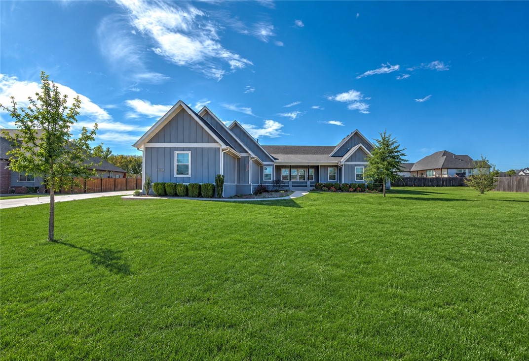 Rare opportunity to own over 2 private acres just minutes from Fayetteville! This stunning 5-bedroom Farmington home offers the perfect blend of modern comfort, open space, and peaceful country living. Built in 2020, the home features an open-concept layout with spacious living areas, abundant natural light, a statement fireplace, and a beautifully designed kitchen made for gathering and entertaining. The split floor plan provides a private primary retreat, while additional bedrooms offer flexibility for guests, a home office, or multi-generational living. Step outside and enjoy the covered outdoor living spaces overlooking the expansive property with endless potential for a future pool, shop, garden, or outdoor oasis. With a 3-car garage,  and convenient access to Fayetteville, Prairie Grove, and I-49, this is the acreage lifestyle buyers rarely find in Northwest Arkansas.