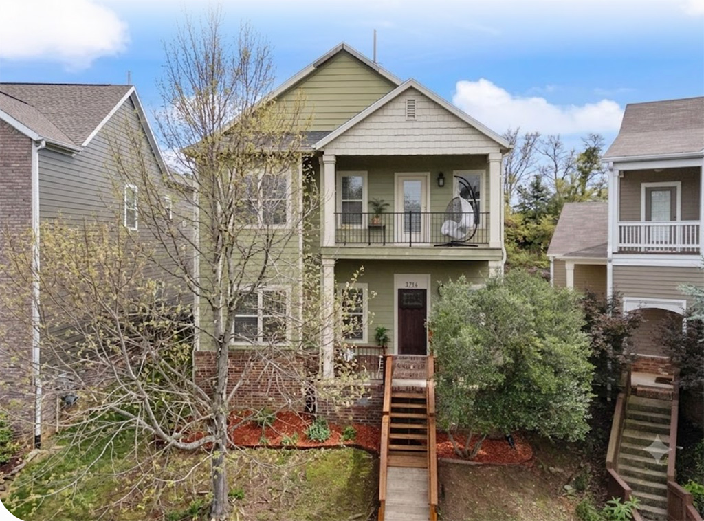 Charming Charleston-Style Neighborhood in the Heart of Rogers! Experience true Lowcountry charm in this spacious home featuring the classic narrow "Single House" layout, grand stately ceilings, and an incredibly spacious floor plan designed for comfortable everyday living.  Perfect floor plan configuration thoughtfully separating the primary bedroom suite and quiet time on the nearby balcony, sitting among the tree tops.   A dedicated outdoor patio space perfect for relaxing, grilling, and hanging out safely with the kids or pets. Spacious main floor living room with massive windows, a bright kitchen with eat-in dining, a versatile dedicated room for dining or home office, a convenient guest half-bath,  laundry area, and storage.  A highly desirable second living room on the upper level, perfect for a media room, play space, or family den.    Rear alley convenience to a spacious two-car garage.  Unbeatably convenient location for entertainment, shopping, medical, schools, trails, and minutes to the new Whole Foods.