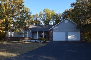 You will love the open living area of this very nice, spacious home in a beautiful setting at the end of a cul-de-sac in a very desirable neighborhood between Harrison, AR and Branson, MO. Cathedral ceilings, huge deck & large covered front porch. Full walk-out basement is semi-finished w/sheetrock, heat & air & 1/2 bath. May be divided and finished to your liking. Come call this place home.