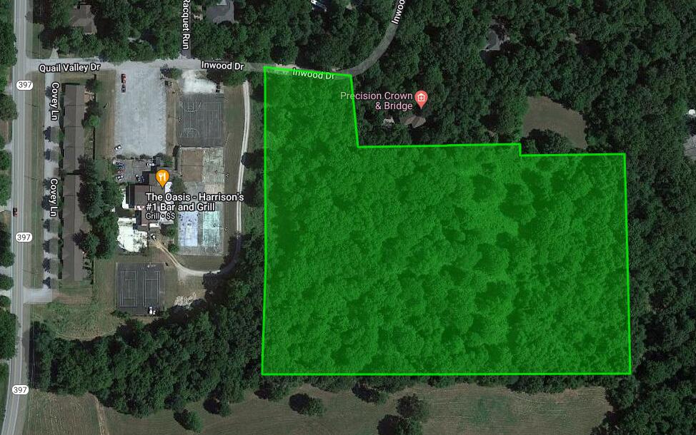 9.94 wooded acres, just minutes from Downtown Harrison, AR.  Level to rolling wooded lot, on Inwood Dr. Harrison, AR.