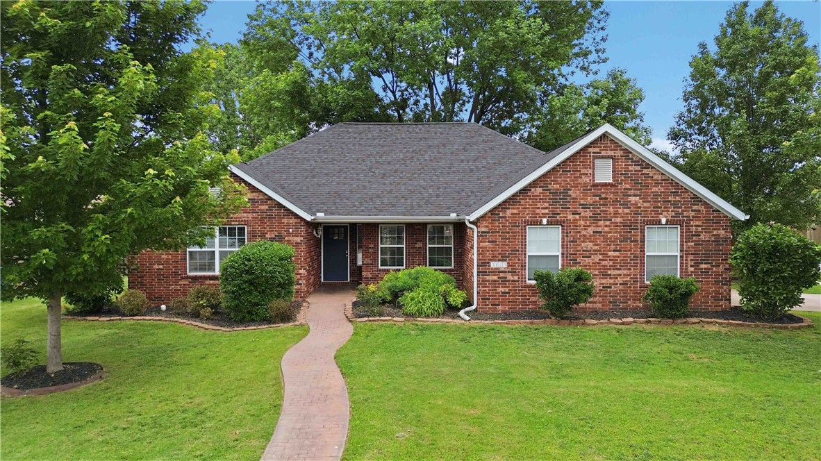 Charming corner-lot home in the established Brightwood Subdivision, just minutes from the Bentonville Community Center, trails, parks, I-49, and the airport! Bright and inviting with tall ceilings, oversized windows, and loads of natural light throughout.

This beautifully updated home features a new roof (2024), fresh interior paint, brand-new carpet, updated lighting, and a cozy gas fireplace with updated tile surround. The kitchen shines with granite countertops, added cabinets and counter space, stylish backsplash, updated appliances, and a built-in bench seat with storage.

Enjoy a functional split floor plan with a spacious primary suite featuring double sinks and a walk-in tile shower. Outside, you’ll love the large flat backyard with plenty of room for entertaining, pets, gardening, playsets, or backyard games, plus a patio perfect for grilling and relaxing. The covered front porch is ideal for morning coffee or unwinding in the evening.