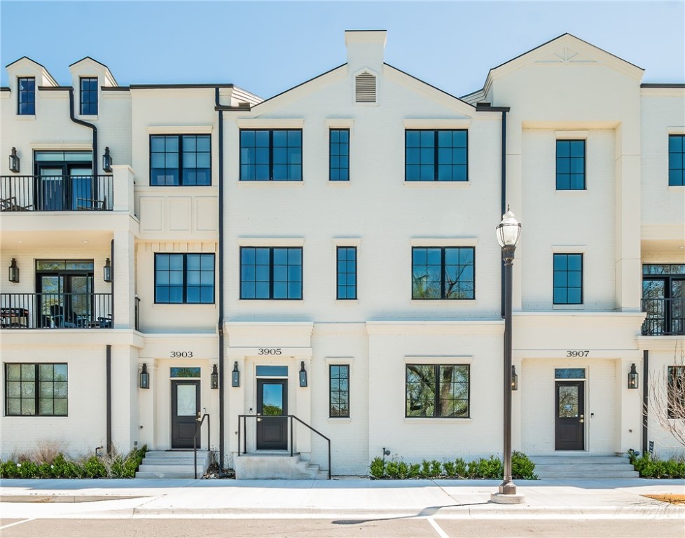 Located on Champions Drive, this stunning new brownstone is situated in the heart of Pinnacle’s urban living. The tastefully composed 2,705 sq ft residence offers three bedroom, three-and-a-half baths with open concept living and entertaining spaces. The great room exhibits large windows with views of the gorgeous sunset over Pinnacle Country Club. The gourmet kitchen features a statement island and high-end appliances and finishes. The light filled primary suite offers a walk-in closet, and a spa like bath with a wet room. Located in Rogers' newest community, with Pinnacle Heights retail, entertainment, and dining mecca just a stroll away. Property taxes estimated based on land only.