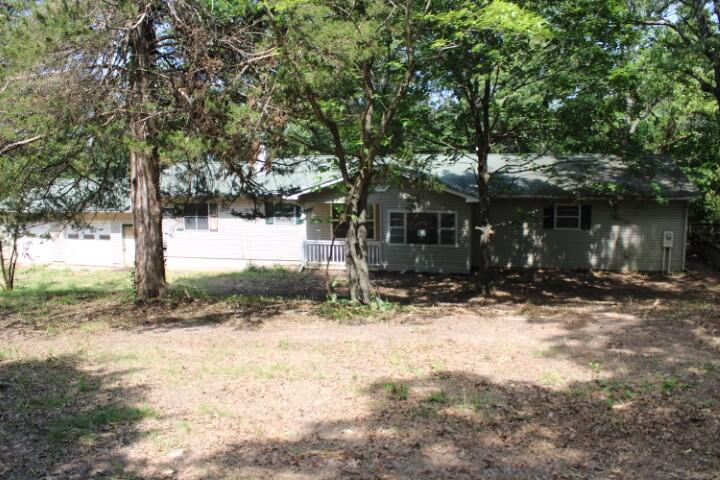 Spacious Home in Private Wooded Setting on 2.3 Acres only 9 miles from town. This is a FHLMAC (Freddie Mac) Homesteps.com ''First Look'' house which means Owner Occupants only (buyers who intend to make this their primary residence) will be considered until 6/28/24, after that date all buyers (including investors) will be considered. Home needs repairs and sold As Is, no repairs prior to closing, seller requires pre-qualify letter from lender with contract - be sure lender will accept property in As Is condition. Buyer & Agents must sign Release/Hold Harmless agreement before enter property due to potential mold, paneling and sheetrock have been removed from basement walls and walls have been treated, see Documents. Age, sq ftg, lot size, acreage, etc, are from public records.