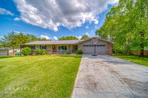 So much square footage and perfectly located in a popular, quiet subdivision.  Beautiful home with 5 bedrooms, 3 full baths, full basement, fenced in back yard, 3 car garage, and a beautiful covered back patio. New windows. New roof 2021.  This home won't last long so don't wait!! Call today for a showing!!