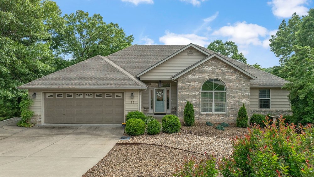 This goregous 3 bed 2 bath home offers a generous 2300 square feet of living space and is presented in great condition, ready for new memories to be made. The heart of this home is an open-plan kitchen, seamlessly flowing into the living room. The kitchen features sleek stainless steel appliances and a convenient peninsula, perfect for casual dining or entertaining. Adjoining this space, the living room provides a warm and inviting atmosphere, centered around a cozy fireplace. Primary bathroom features a jetted bathtub for relaxation, a double vanity offering ample counter space, extensive storage solutions, and a spacious layout that includes a walk-in shower. Additional features of this ranch-style home include a versatile basement, an attached garage for convenience, and a dedicated laundry room.