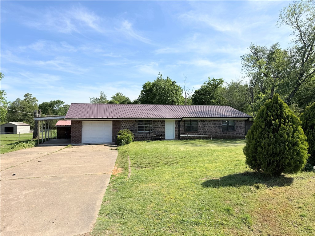 Absolutely adorable 3-bedroom, 2-bath home situated on a large lot! This home offers a spacious layout perfect for comfortable living and entertaining. Enjoy the convenience of a one-car garage plus an additional carport for extra parking. Step out back to a deck that’s perfect for relaxing or hosting gatherings. With plenty of room inside and out, this property is one you won’t want to miss!
