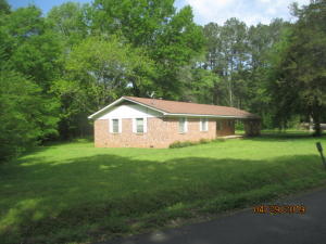 Brick home, 2-car carport, covered patio with storm shelter under the patio, storage shed and central heat and air. Seller will not complete any repairs to the subject property, either lender or buyer requested.  The property is sold in AS IS condition.