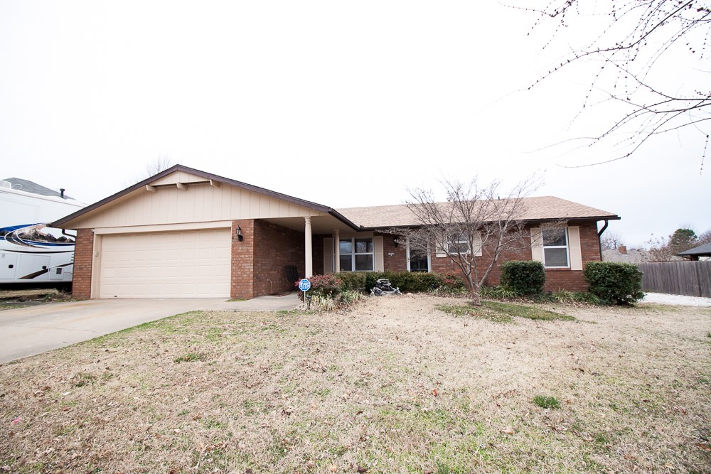 Great location just off of Hwy 412, close to I-49! This spacious home features brick exterior, enclosed sunroom/covered patio & a nice yard with a storage shed! Interior features include inviting family/dining room, living room with a fireplace to enjoy your time with family in, kitchen with new range, breakfast area, carpet & tile flooring, refrigerator conveys! Work bench in garage will stay, plywood in the attic for storage. Per seller:roof, water heater & a/c unit replaced within last ten years!