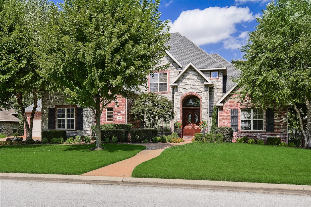 Sophistication in Professional Design Express the Latest in Modern Living! Elegant Foyer boasts Soaring Ceilings & Dramatic Staircase. Spectacular Chef's Kitchen w Double Sinks, Wet Bar, Designer Appl. & Open Living Rm w Toasty Stone FP. French Doors to Outdoor Oasis. Brick Veranda w TV, Firepit Area & Landscaped Private Backyard. Gorgeous Din. Rm, Rich Library w Built-ins, 2nd Office,& Private Guest En-Suite. Master Quarters offers Tons of Natural Light w Walk-in Closet & En-Suite Bath! 3 Oversized Bedrm En-Suites upstairs, Spacious Bonus Rm & Separate Media Rm w Kitchenette.