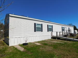 Fenced 1.49 acre Crow Mountain property with private gate.2014 76 x 16 Champion Make Atlantic model 1605 sits on back of the property very clean looks great on the inside.