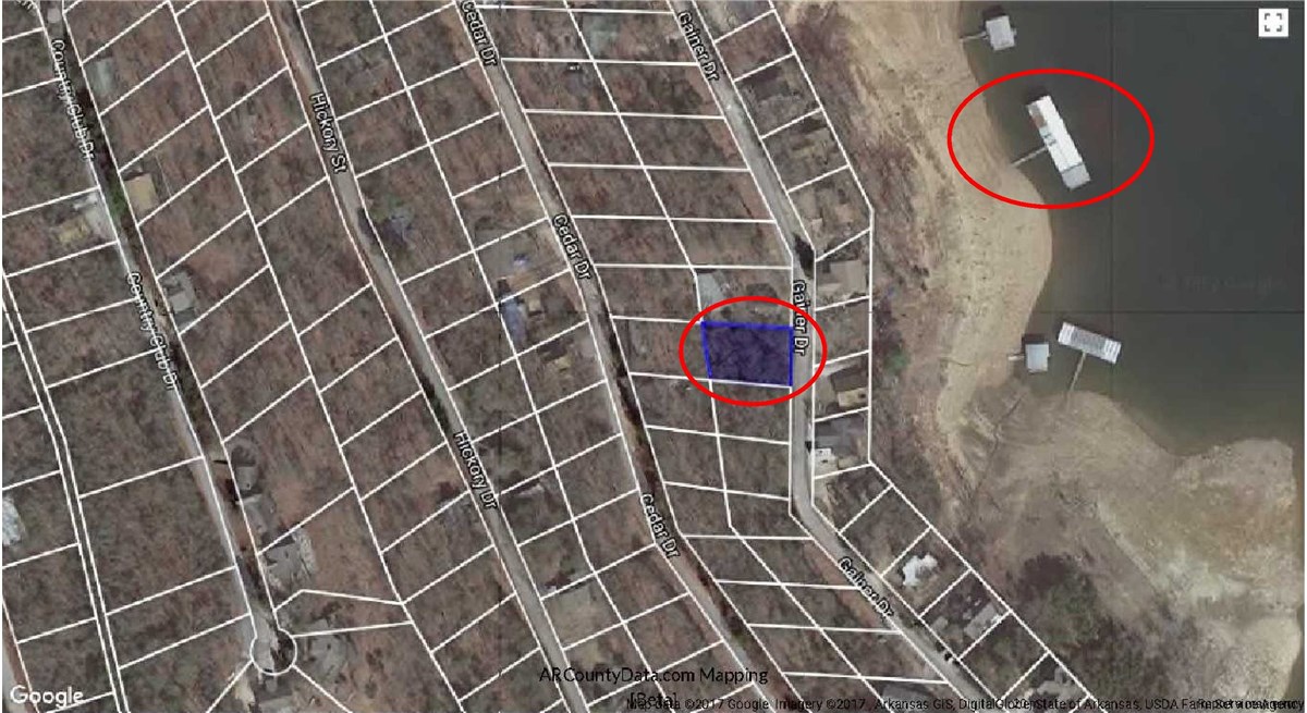 Nice lot in Lost Bridge Village.  Perfect spot to build your dream lake home.  Across the street from lake and a 1 minute walk to your boat slip in community dock.  Generous 10X24 boat slip that includes Ozark Lift!  Great lake view potential depending on where you build.