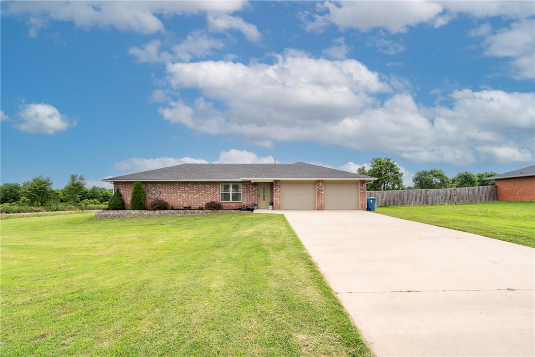 Built in 2016, this well-maintained 3-bedroom, 2-bath home sits on a generous .67-acre corner lot and features durable brick and concrete siding. The split-bedroom floor plan includes an open living/kitchen/dining area ideal for everyday living and entertaining. Kitchen boasts stainless appliances, gas range and granite countertops; bathrooms also feature granite. Bedrooms are generously sized. Outdoors offers a privacy fence, separate chain-link dog run and a storage building—ample space for pets, hobbies and outdoor living. Move-in ready and perfect for buyers seeking space and privacy.