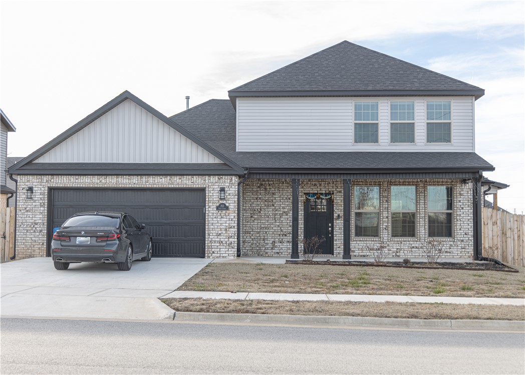 Discover the enchanting features of this delightful four-bedroom, two-and-a-half-bath residence, perfectly located in the heart of Centerton! This east-facing home, set on a corner lot, offers modern conveniences, including a Nest thermostat, Ring doorbell, and much more.  The well-equipped kitchen beckons you to enjoy meals in its lovely eat-in area, filled with natural light. The garage, featuring epoxy flooring, adds a practical touch, while the designer lighting and built-ins in the living room bring stylish functionality. For your convenience, a washer, dryer, and refrigerator are included.  Step into the fenced yard, enhanced with solar lighting, blinds, and gutters. Relax on the spacious and inviting front porch, or retreat to the covered back patio—both ideal spots for unwinding.