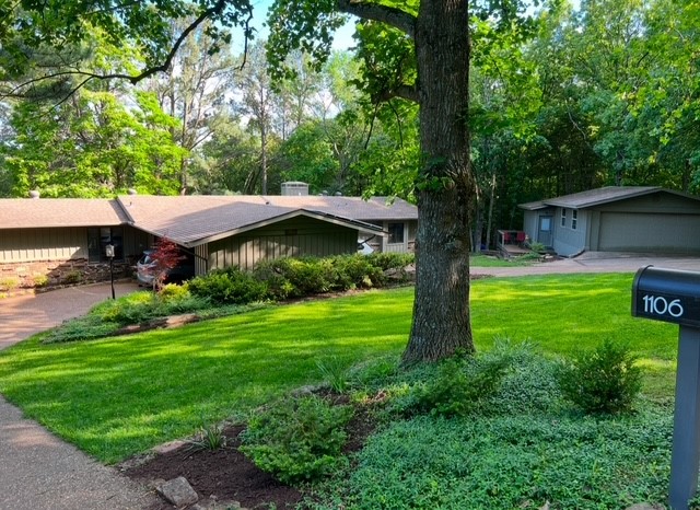 Mt. Sequoyah Mid Century Modern Classic! These don't come available very often!  Built in 1964 with an addition in 1978, this beautiful home has had major renovations completed - new roof, heat & A/C systems, water heater, kitchen appliances -all updated in recent years. 2 fireplaces, 2 living areas, potentially 2 master bedrooms, hardwood floors, pantry, 450 sq ft heated and cooled workshop area.  Fresh Paint! Enjoy winter views and summer privacy.