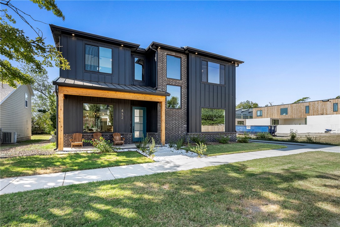 Modern Luxury in the Heart of Bentonville – Prime Location! Discover a stunning newly built home that perfectly blends modern elegance, functionality, and the unmistakable Bentonville vibe! Nestled just behind the original Walmart home office, this remarkable home is only steps away from family-friendly parks, scenic trails, top-tier restaurants, vibrant shops, and buzzing nightlife. Designed for flexibility, this home offers multiple living options: Enjoy the entire space with its open-concept design, high-end finishes, and a chef’s kitchen with large granite island and Café appliances. Or maximize your investment by renting out the private 1-bedroom, 1-bath apartment with a separate entrance, full kitchen, and utility space-a perfect turnkey Airbnb in a high-demand location! Whether you’re looking for your dream home or an income-generating opportunity, this property is a rare find in the heart of Bentonville! Note-the back patio is wired for a hot tub. Up to $8,000 closing cost credit if using preferred lender.