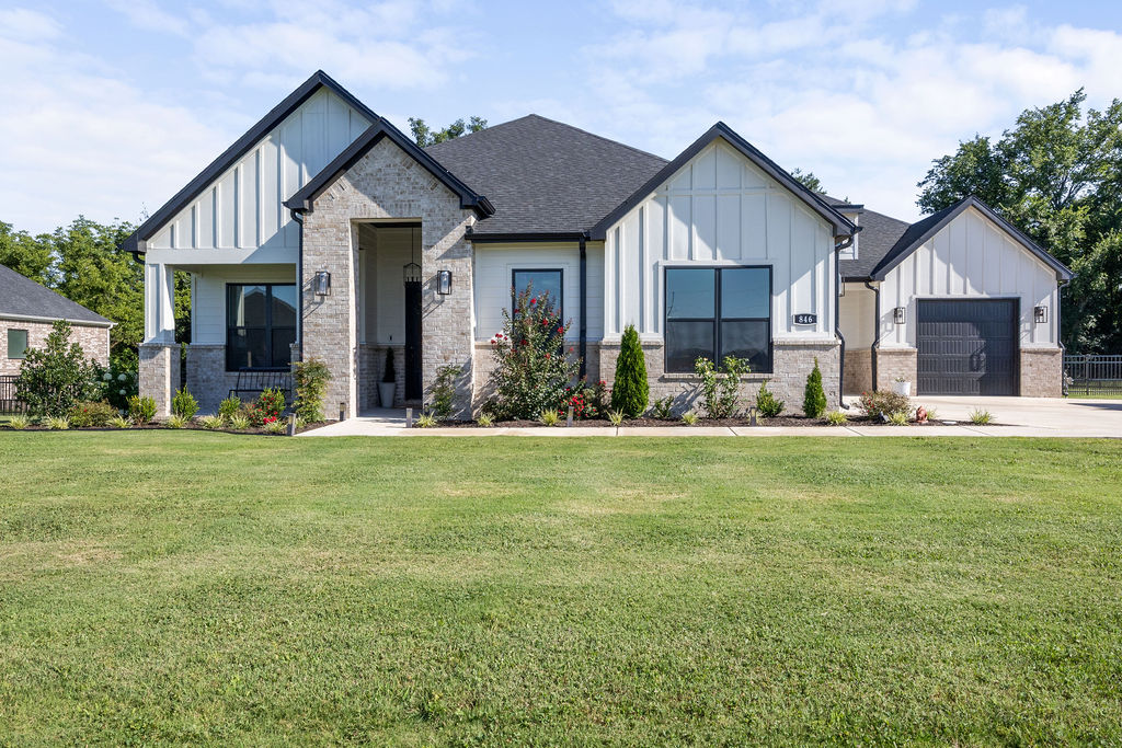 Located in Ashers Ranch in the heart of Goshen, just 15 minutes from Fayetteville, this impeccably maintained home is the perfect blend of peaceful country living & modern luxury. The light-filled, one-level open floor plan features 4BR, 3BA + a dedicated office. The entertainer's kitchen features quartz countertops with a waterfall island, ceiling-height cabinetry, farmhouse sink, spacious pantry, & KitchenAid stainless steel appliances, including gas cooktop, double ovens, and microwave drawer. Exceptional storage is found throughout the home, along with smart-home upgrades, including interior and exterior smart switches with timers and motion-sensor lighting in the pantry and primary closets. Enjoy outdoor living on the covered back patio or the separate grilling patio just off the kitchen. The backyard features a metal puppy fence, with the property extending into the adjacent woods. Beyond the wooded area, you'll enjoy the privacy of 13 acres of POA-owned green space, creating a peaceful natural backdrop.