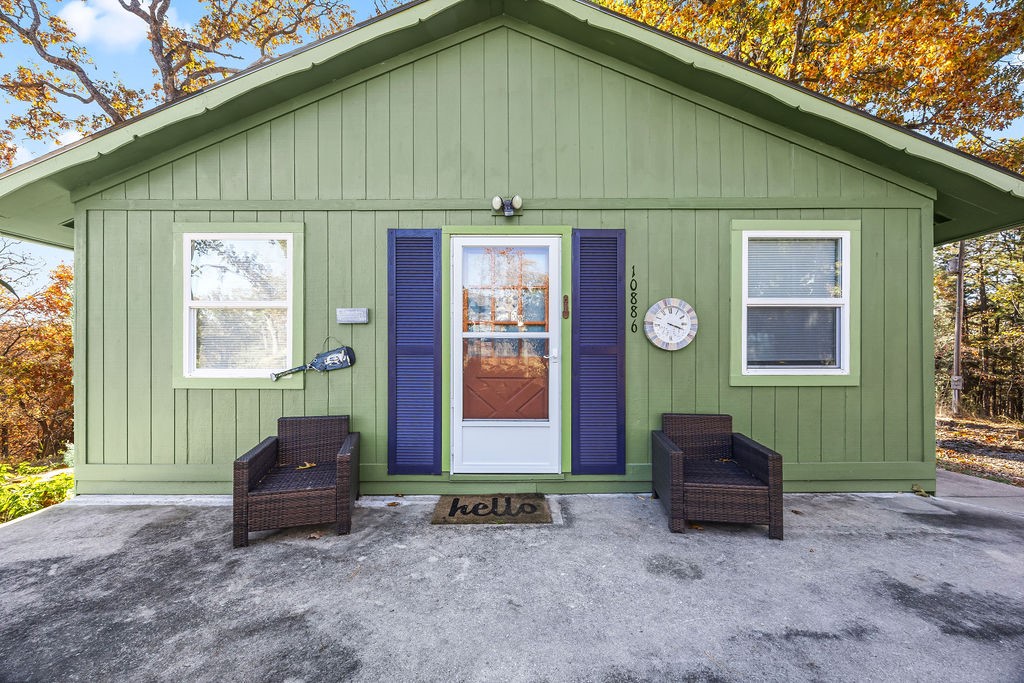 *Back on the market at no fault of the seller!* Super cute cabin/cottage sitting on 2 acres, walkable to public opening to Ventris Cove on Beaver Lake! Remodeled 3BR/1BA with unfinished basement. Completely repainted in 2024. New gutters. New carpet throughout. New well pump and electrical wiring installed 2026 — service records and current water test available. Central heat and wood burning stove perfect for a cozy winter retreat. Separate workshop, potting shed, and carport/storage. This beautiful property is in a fantastic location, just 35 minutes from downtown Bentonville or Rogers. *Refrigerator conveys. AC window units convey. Note there is also a mini-split system in the closet that will convey and could be installed.*