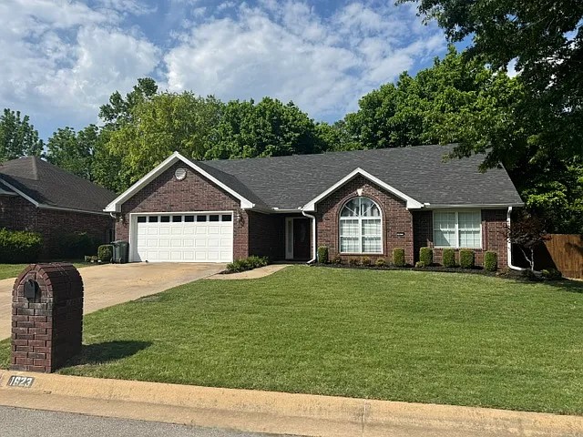 Welcome home to this beautiful 3-bedroom, 2-bath home in desirable West Fayetteville! Tucked away on a quiet cul-de-sac, this home offers an open-concept layout with vaulted ceilings, hardwood floors, granite countertops, stainless steel appliances, and a spacious living area perfect for everyday living and entertaining. The bedrooms feature cozy carpet, while the bathrooms are finished with tile flooring. Enjoy the privacy of a wooded backyard, all while being just steps from Bundrick Park and minutes from the University of Arkansas, shopping, dining, and everything Weddington has to offer.