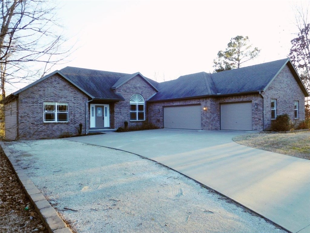 Fabulous and spacious family home with new wood flooring, carpet, and appliances. Downstairs has a large family/entertainment room with wet bar and additional gas log fireplace. 2 decks overlook large privacy fenced yard and complete seclusion. Basement is partially finished with saferoom. Exterior is brick and hardy board. This is a Fannie Mae Homepath property.