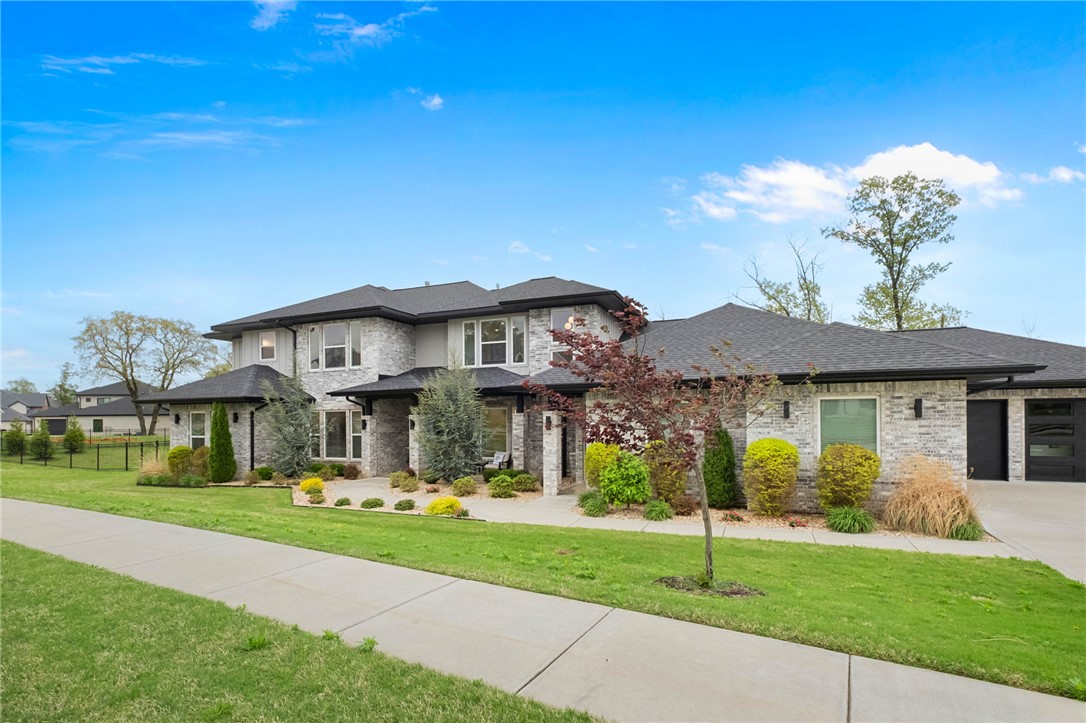 Experience elevated living in this exceptional residence, perfectly situated w/in a gated community on a beautifully landscaped .94-acre lot. Offering 5,347 sq ft, this thoughtfully designed home features 5 bdrms, each w/private en suite, delivering both comfort & privacy for family & guests alike. The open-concept main living area is ideal for entertaining, seamlessly connecting the spacious living rm, dining area & a well-appointed kitchen. A dedicated study/music room provides a quiet, versatile space perfect for working from home or creative pursuits. A second living room on the main level adds versatility & includes a wet bar along with direct access to the covered patio. The main-level primary suite is a true retreat, complete w/a spa-inspired bathrm, an expansive closet w/custom built-ins & convenient access to the laundry rm. Outdoor living is just as impressive w/a large, fully fenced backyard, covered patio featuring a built-in grill & newly extended patio with pergola offer perfect year-round enjoyment.