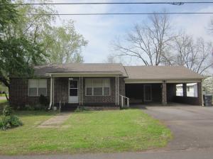 Brick home on corner lot with spacious fenced backyard.  Well kept and well maintained.  Updated bathroom and kitchen cabinets and flooring.  Seller will provide home warranty.  Enjoy the back deck and the dogwood, Japanese maple and lovely iris beds scattered through the yard.