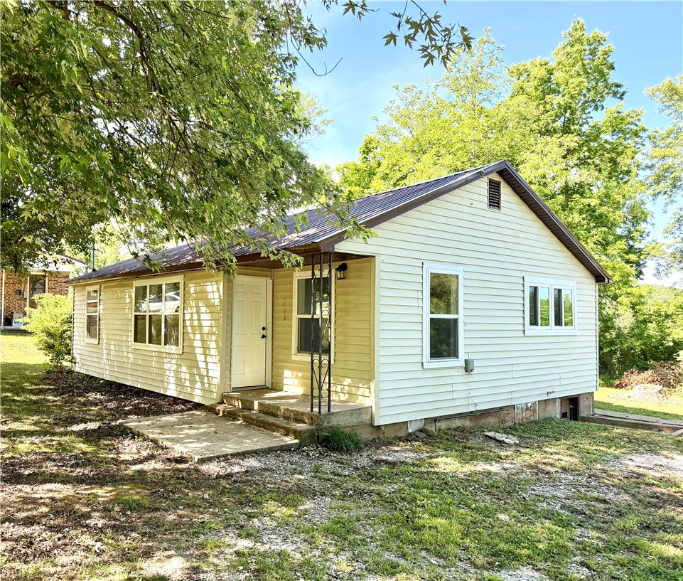 This updated, professionally cleaned, well-maintained 2-bed, 1-bath home situated on 0.32 acres is in the heart of Huntsville. This home offers an updated kitchen, a designated breakfast/dining area, a living room with abundant natural light, 2 spacious bedrooms with closets, an updated bathroom with a roomy shower and linen storage, and a large utility room perfect for extra storage, crafting area, or office space. Just outside, you’ll find a walk-in basement/cellar perfect for storage. Recently updated with windows, gas lines, water heater, HVAC, plumbing and electrical, the vinyl siding and durable metal roof make this home move-in ready! Don’t miss your opportunity to own this adorable home close to shopping, restaurants, schools, and parks!