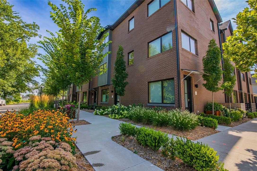 A legacy project to own in Downtown Bentonville. The AJ Project features 9 newly constructed row homes located two blocks from the Momentary Museum and directly across the street from Thaden School. The Bentonville Square, Walmart’s new Home Office, and the new STEM-based university campus at the former Walmart headquarters are all within five minutes of the property. With only a handful of vacant lots remaining downtown—many trading near $80 per square foot—and increasing sewer capacity constraints, this is a rare opportunity to own new construction without the complexity of development in one of the most desirable locations in the country. The row houses are offered fully furnished and convey with the sale, providing a true turnkey ownership opportunity.