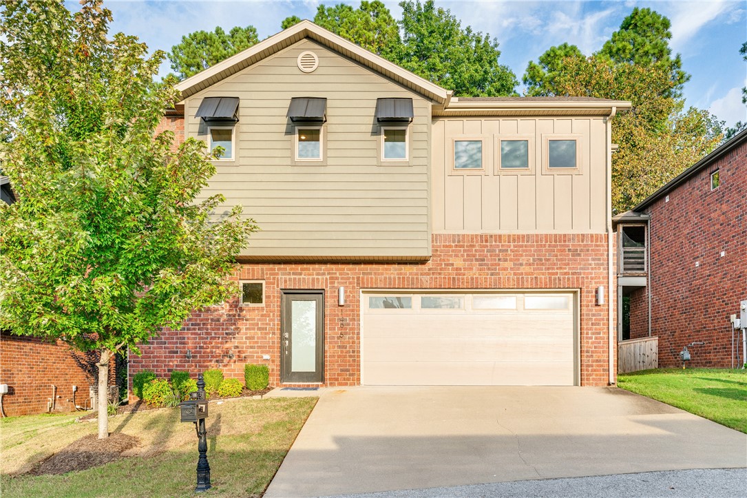 Stylish and thoughtfully designed, this 3-bedroom, 2.5-bath home in central Fayetteville offers comfort, function and a prime location. With an open-concept layout, the main level connects the living and dining areas to a well-appointed kitchen with granite countertops, a gas range and ample cabinetry—ideal for everyday living and entertaining. The primary suite provides a relaxing retreat with a spa-like bath offering a soaking tub, walk-in shower and an expansive closet. On the lower level, two spacious guest bedrooms and a full bath provide flexibility and privacy for family, guests or a home office setup. Outdoor living is enhanced by a screened-in porch overlooking mature trees, creating a peaceful setting for morning coffee or evening relaxation. Recent updates, including newer wood flooring and refreshed landscaping, contribute to the home’s move-in ready appeal. Conveniently located near shopping and downtown Fayetteville, this home offers modern comfort in a highly desirable setting. TO BE SOLD AS IS.