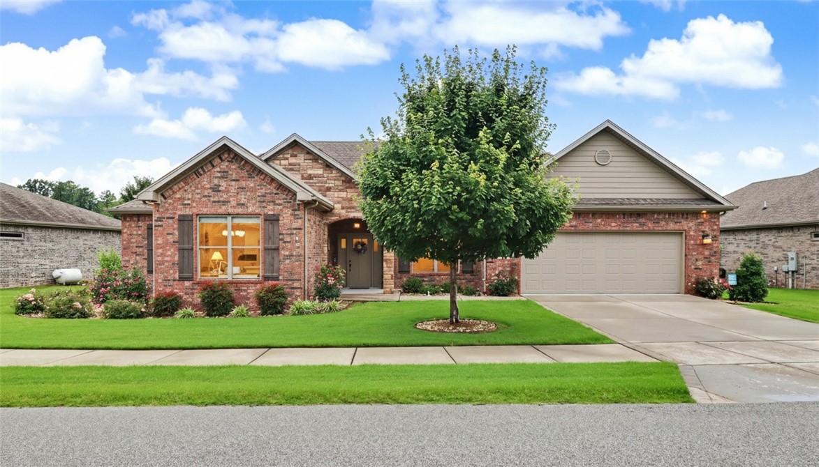 Live life to the fullest in Country Club Villas, where lawn maintenance is included so you have more time to enjoy life! Experience a true sense of community with sidewalks, a common green space behind the home, and a location just minutes from the country club, golf, and dining. This meticulously maintained home features beautiful wood floors and a spacious open floor plan. The dream kitchen offers an induction cooktop, Bosch dishwasher, abundant cabinetry, and opens to both the formal dining room and breakfast nook. The split-bedroom plan provides privacy, while the spacious primary suite overlooks the green space and includes double vanities, a walk-in shower, and a relaxing retreat. A new HVAC system was installed in 2025 for added peace of mind. Move-in ready and offering the perfect blend of comfort, convenience, and low-maintenance living!