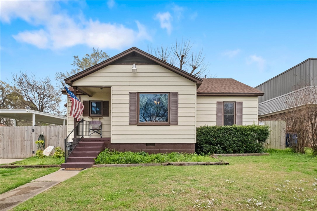 PERFECT AIRBNB, INVESTMENT RENTAL, COLLEGE STUDENT HOME, PROFESSOR, RETIRED FAMILY! Come see this extremely well-maintained home, VERY close to UAFS, offers 3 bedrooms, 1 bathroom (fully gutted/remodeled), hardwood floors (originals), spacious considering the lower SF, open living area, good size kitchen with a walk-out area to a HOT TUB, covered carport with a great decked backyard for visitors/entertainment or gazing at the stars at night, enjoy complete privacy backyard, as well as a great storage building very clean and ready for you to convert into your own man cave/she shed (easily can be a hobby area or office outside of the home). GREAT opportunity and affordable! Let's talk! Call today for a showing! Safe will stay and furnishings are up for discussion! Turnkey READY!