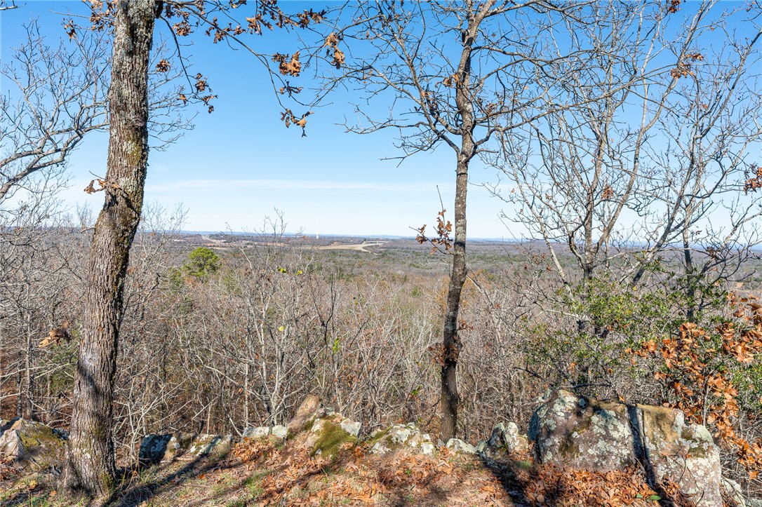 This stunning 40-acre property offers unbeatable 360° views and endless potential. Whether you’re dreaming of a custom home or a private weekend retreat this land checks every box.
Situated just 1 mile from Hwy 71, you’ll enjoy the perfect blend of privacy and convenience. Explore the property’s natural beauty and
enjoy abundant wildlife, a small pond, established trails, and beautifully wooded terrain perfect for exploring, hunting, or simply enjoying the quiet.
Multiple build sites let you choose the view you want to wake up to—mountain vistas, open skies, or total seclusion.
A driveway is already in place, and with a recent survey and perc test completed, this property is truly ready for your vision. Come take in the views and imagine the lifestyle you could create on this remarkable piece of Arkansas land.