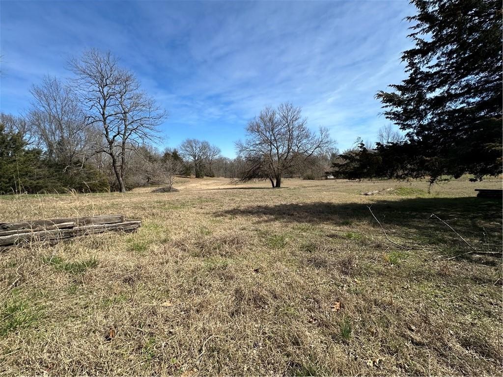 Development potential on 5.11 acres categorized under Rogers Future Land Use as Neighborhood Fabric that offers a diverse mix of housing options ranging from single-family homes, Pocket Neighborhood of tiny homes or cottage clusters with the current zoning.