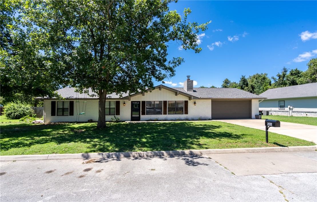 4 Bed 3 Bath with two Primary Suites and two Living Rooms on a lot that backs up to an empty field with a gorgeous view from the covered patio! Also has an oversized garage with 110 square feet of heated & cooled office space that is not included in the listed square footage. New roof and covered patio in 2020, new furnace and on demand hot water heater in 2022 and new dishwasher in 2023. All new plumbing in slab of original house about five years ago. New walk-in shower and toilet in hall bath, granite counters, wood look tile, walk-in closets, pantry, extra storage, built-ins, cathedral ceilings, wood burning fireplace in main living room, two hot water heaters, built in electric insert in den, two eating areas and more. Playset and storage building both convey. This is perfect for a growing family. There is also access to a creek at the end of the road. Must see to appreciate!!
